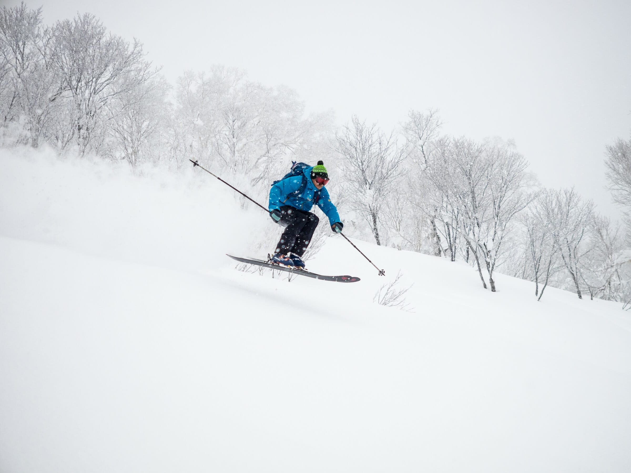 A skier turns through powder on Haruka-yama's Katsuraoka route near Otaru