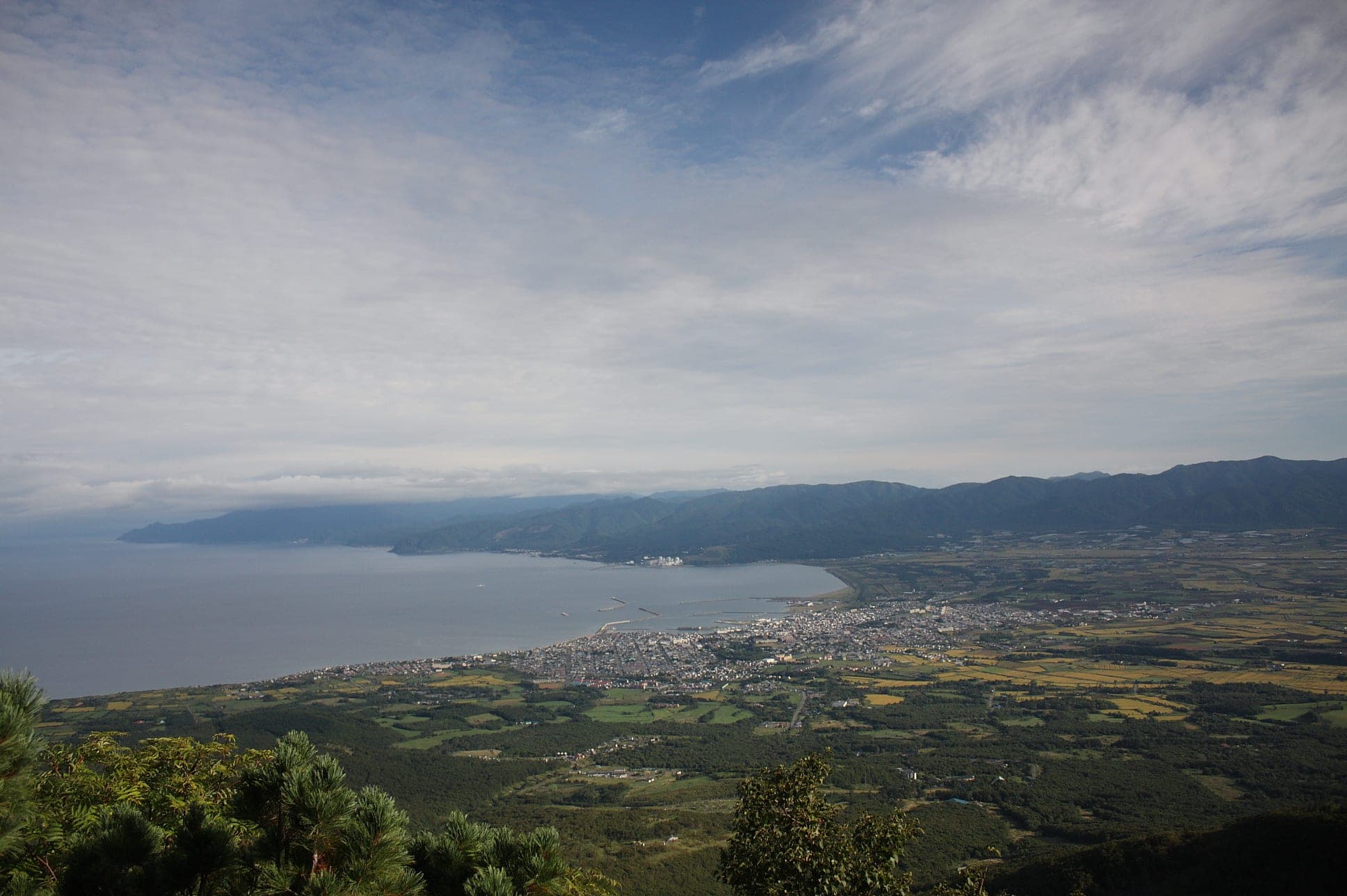 Iwanai town and the bay seen from the slopes of Iwanai-dake in summer