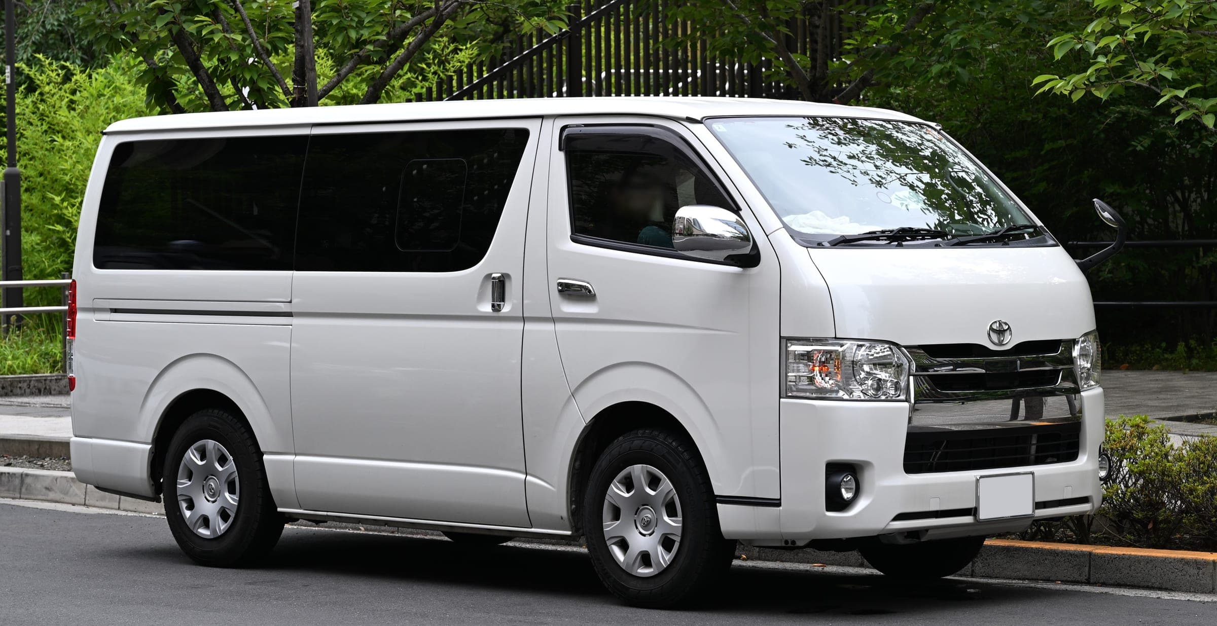 A white Toyota Hiace Super GL, the van behind the Hiace that Bowken rents in Sapporo