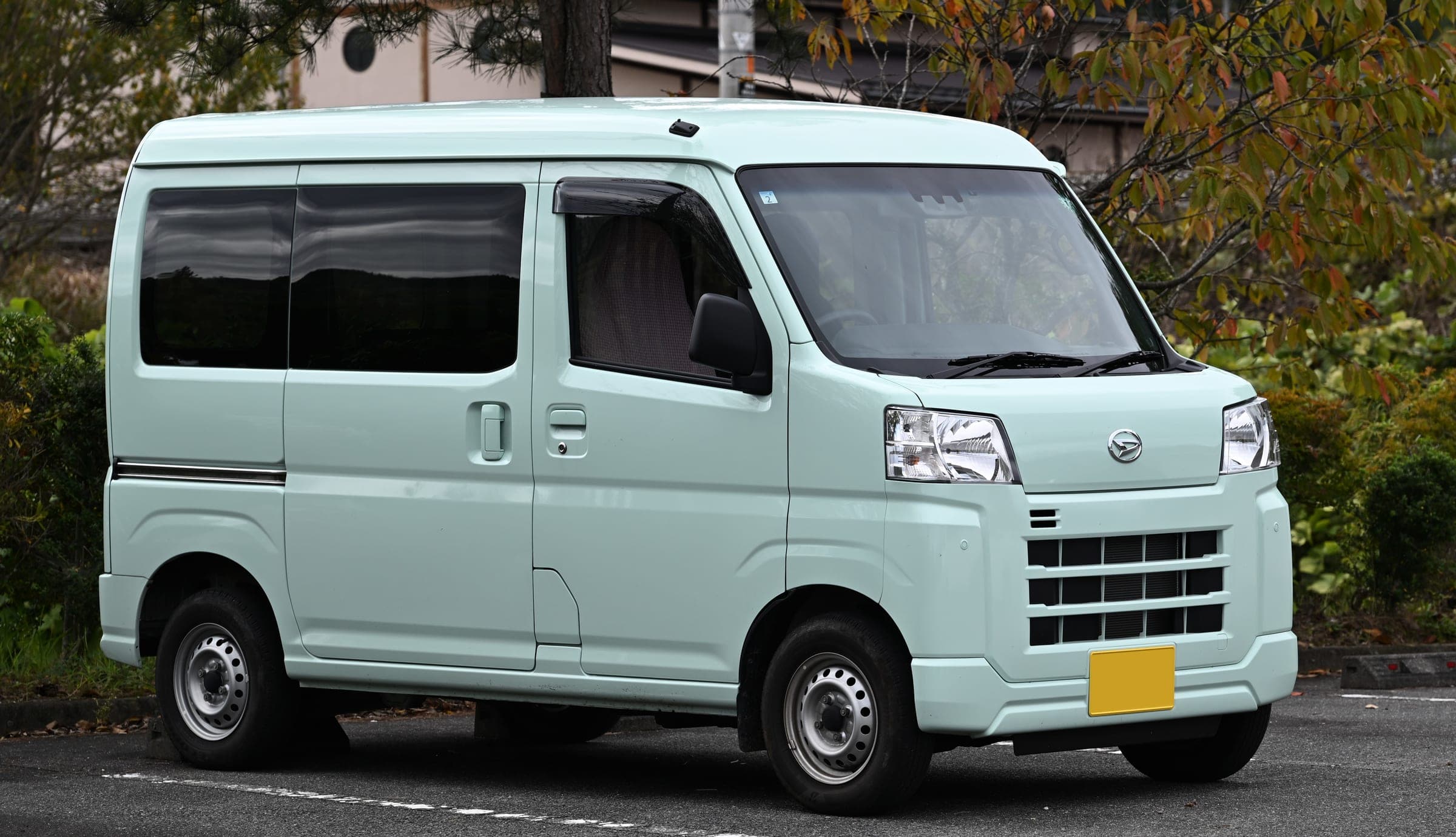 A 2021 Daihatsu Hijet Cargo, the kei van behind Camping Labo's smallest camper