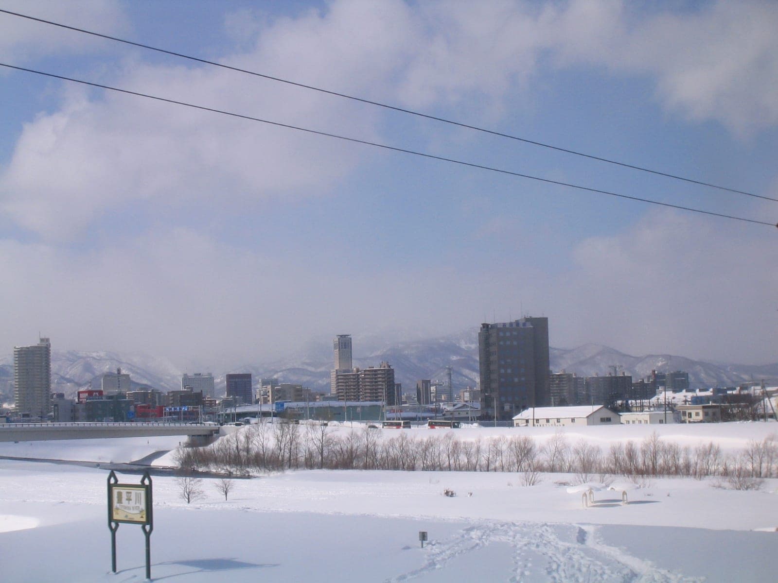 Snow along the Toyohira River in Shiroishi Ward, Sapporo, where Kegani Camp keeps its vans