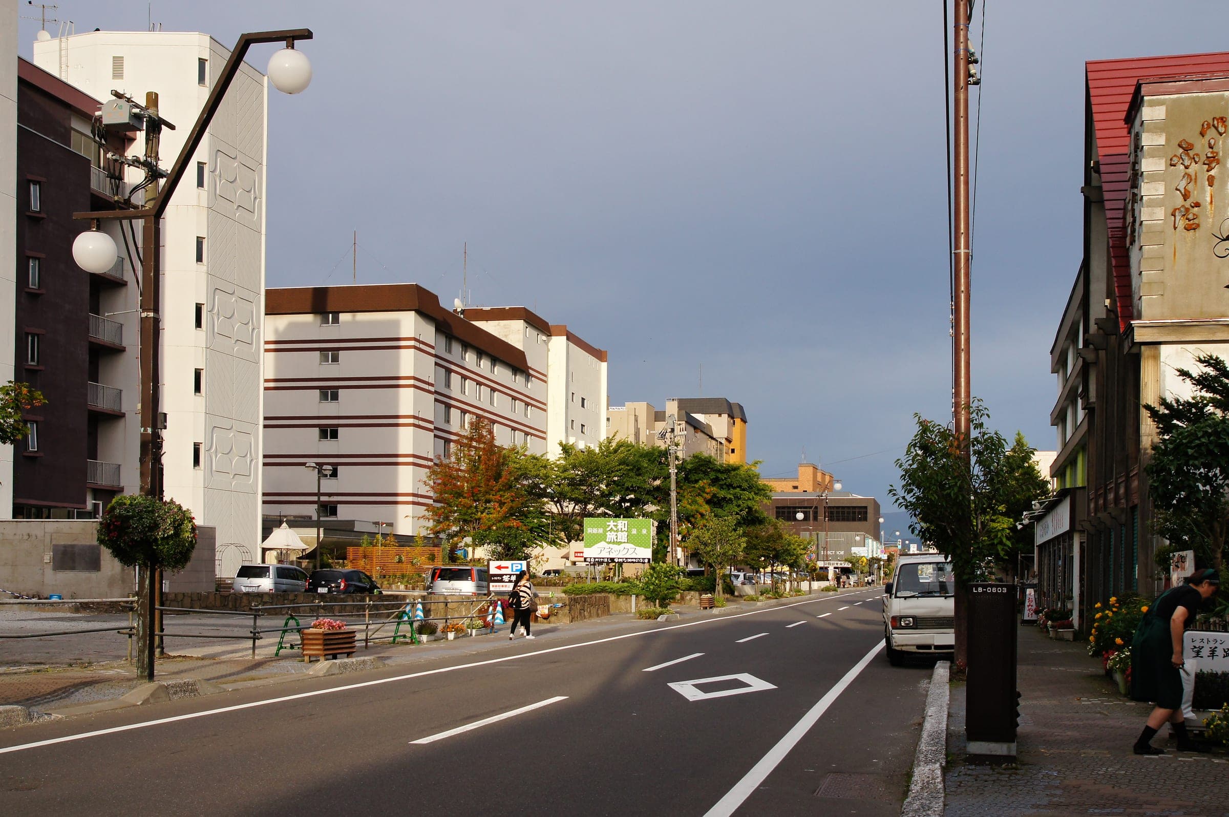 Hotels and shops line the main street of Toyako Onsen