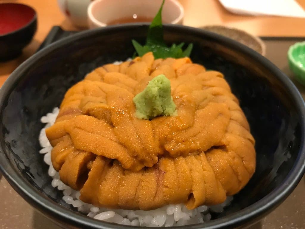 A bowl of raw sea urchin over rice with wasabi at Uni Murakami Honten in Hakodate