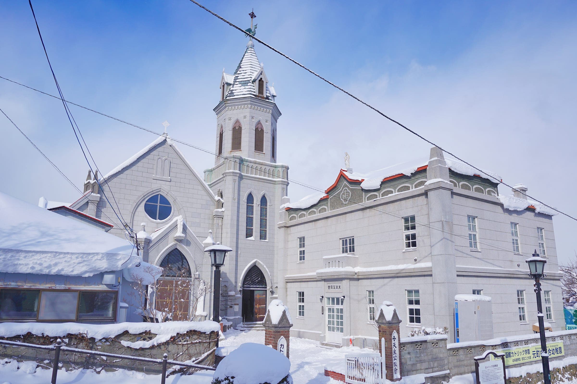 Motomachi Catholic Church and its neighbours under fresh snow in Hakodate