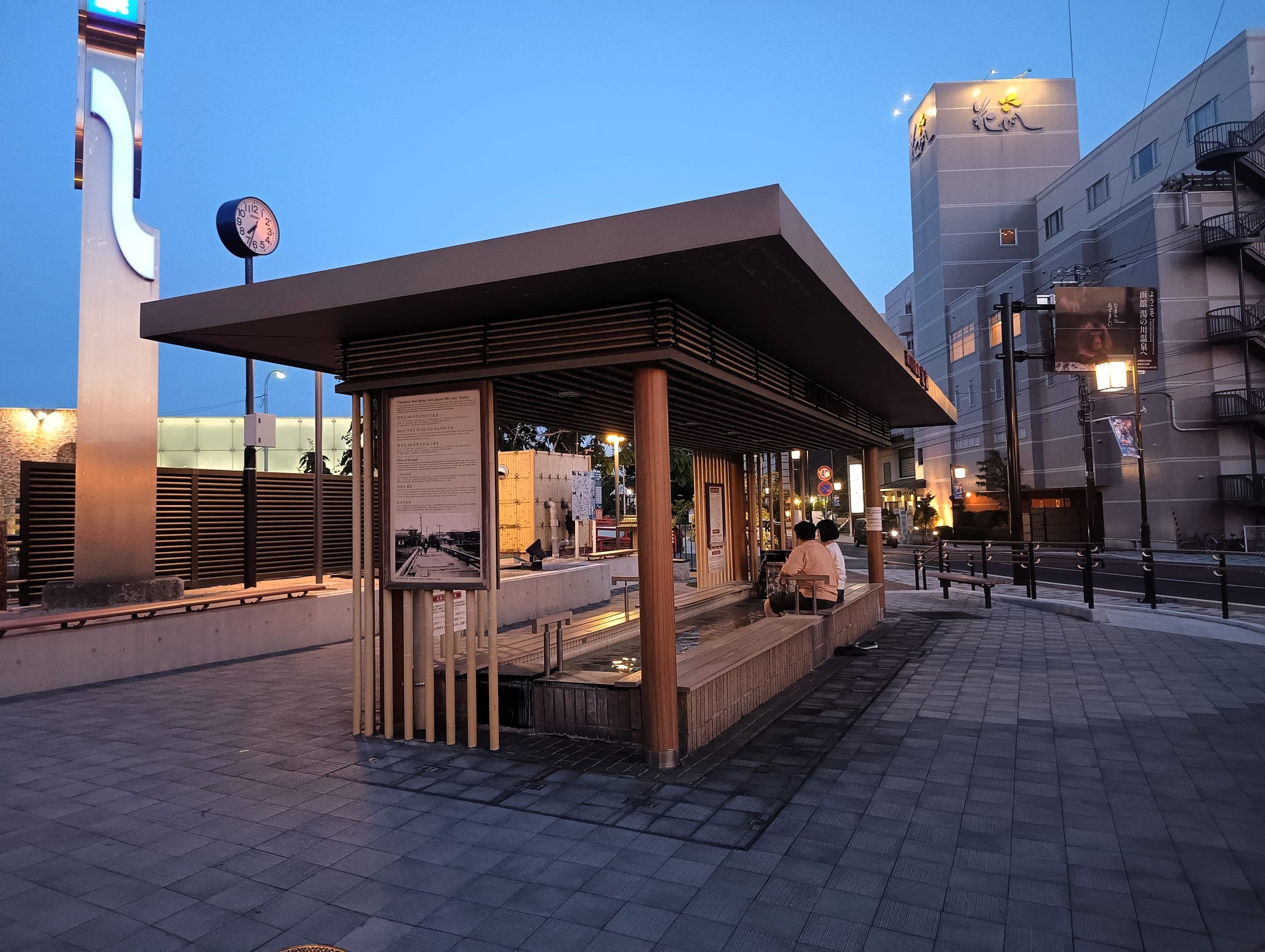 A roofed public footbath beside the street in Yunokawa Onsen