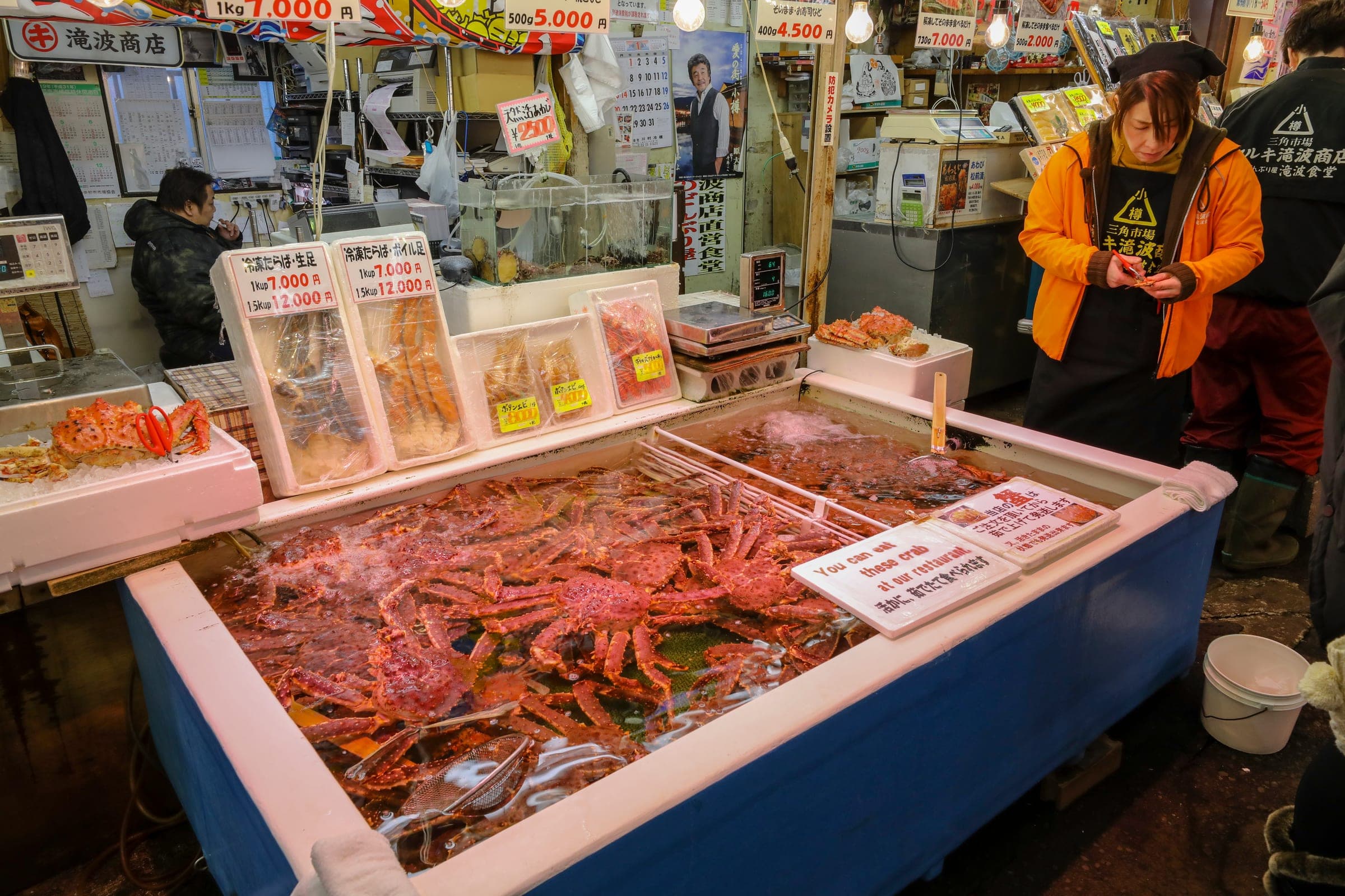 King crabs fill a seafood display at Sankaku Market beside Otaru Station