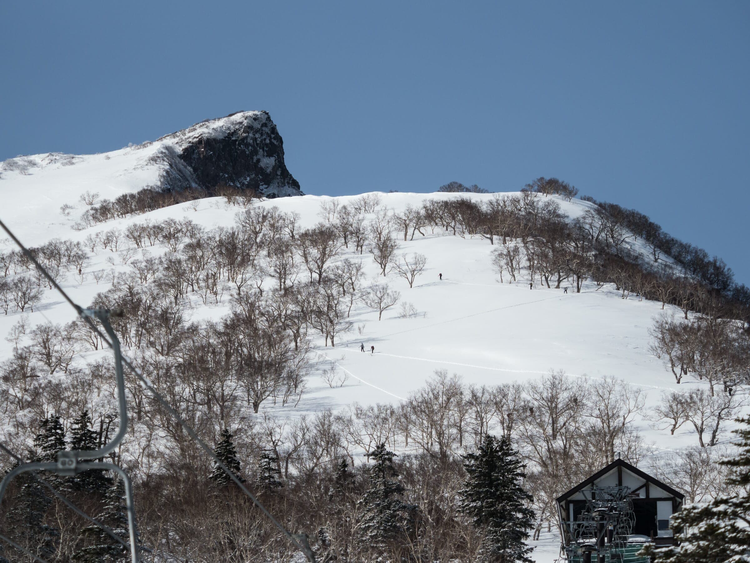 The broad east-northeast face of Kurodake rises above the top of the Sounkyo chairlift
