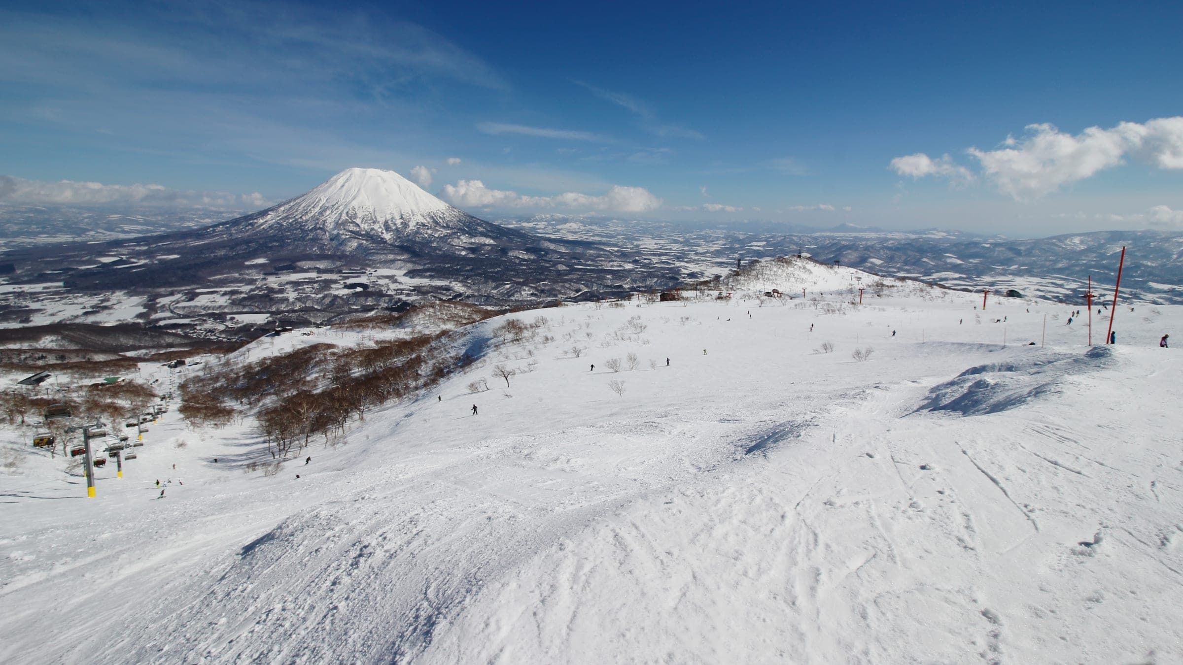 Mt. Yotei's snowy cone rises across the valley from the ski slopes of Niseko Annupuri