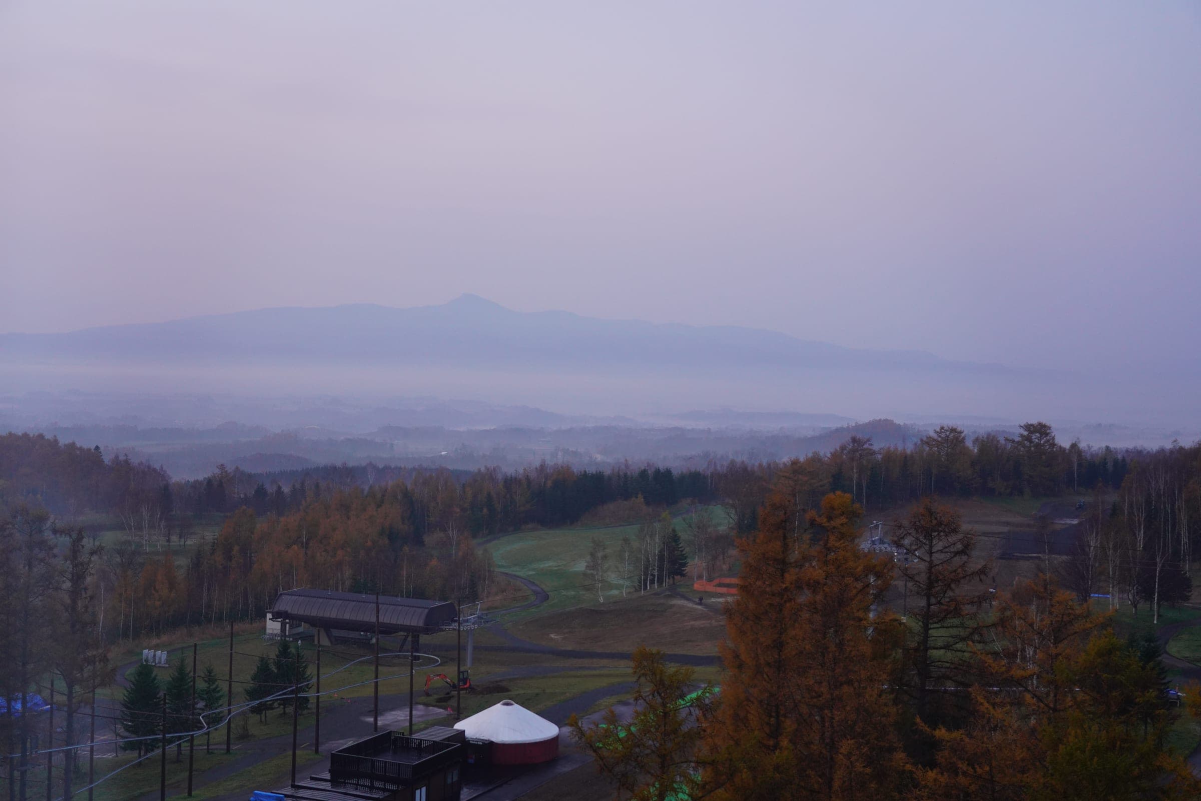 A misty dawn over the Niseko valley from the Hilton Niseko Village