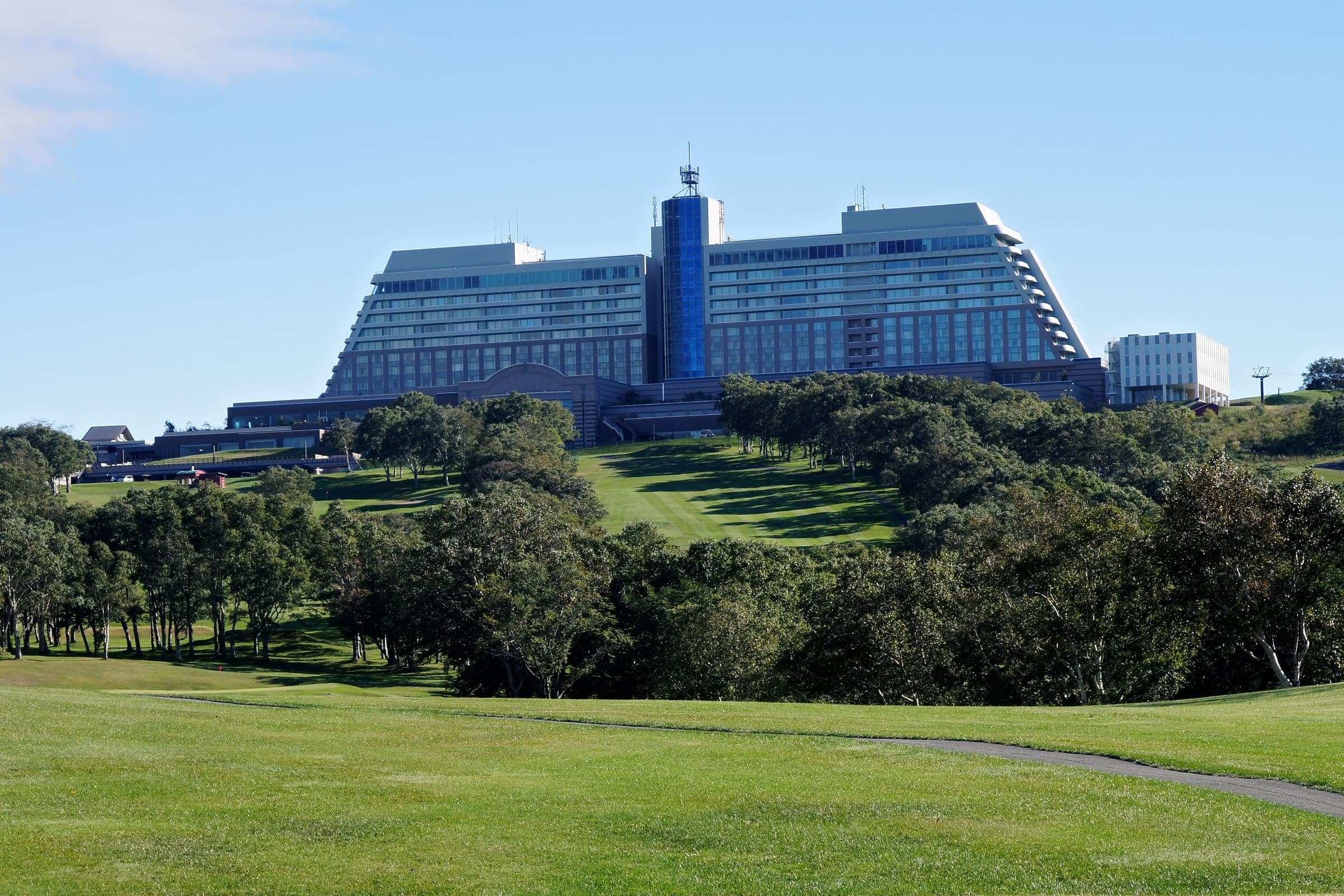 The Windsor Hotel Toya spread along its hilltop above green forest
