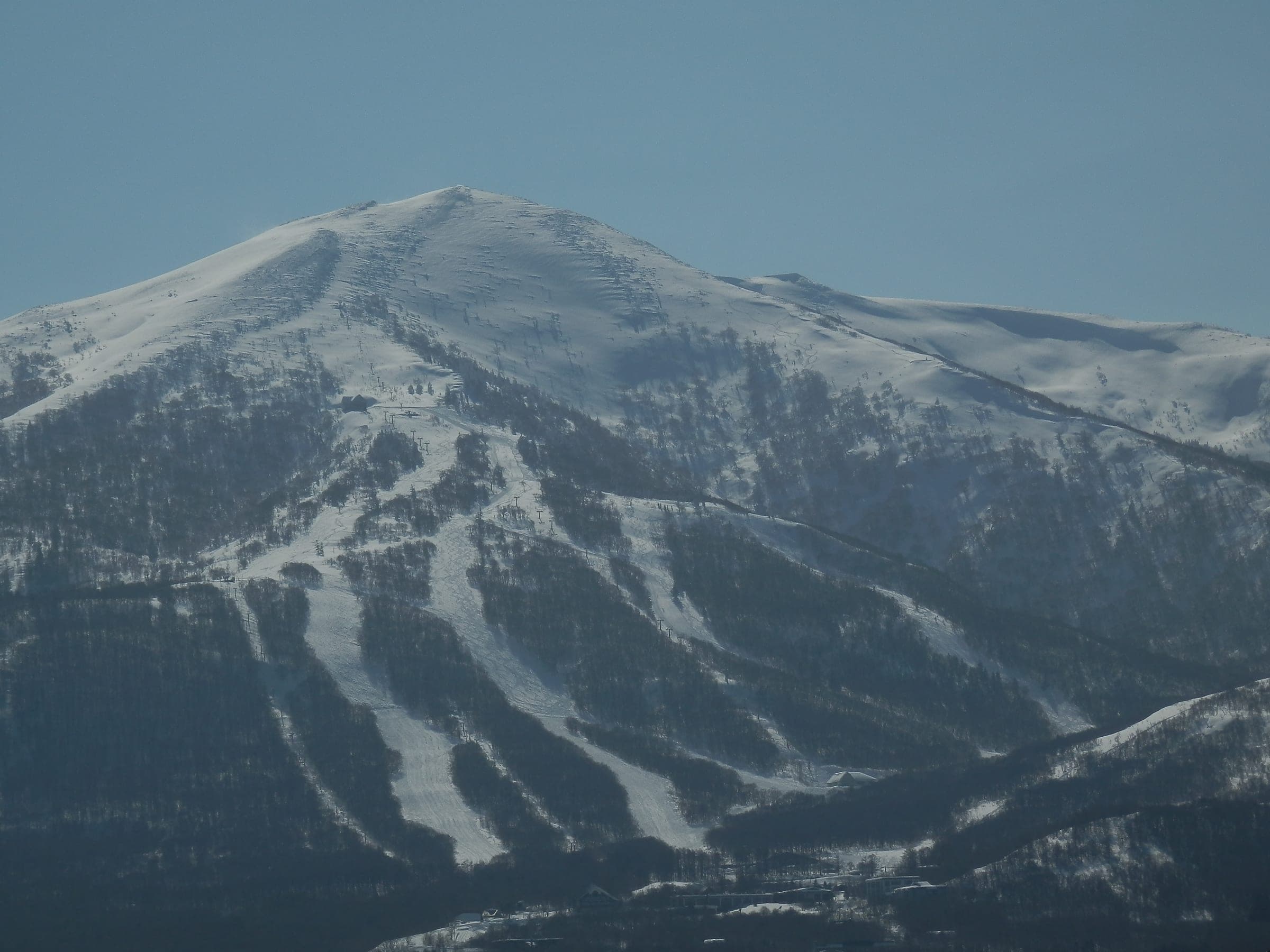 Snow-covered Mt. Iwanai, where Iwanai Resort runs its cat-skiing