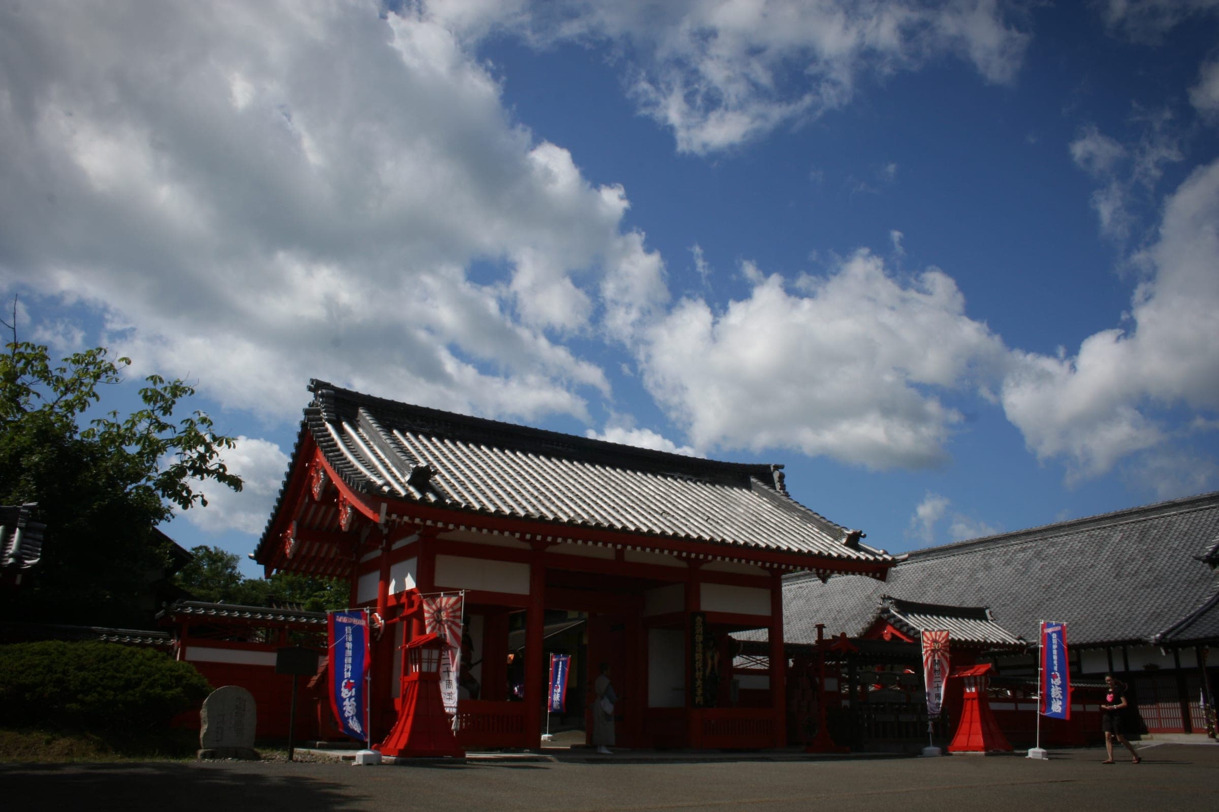 The red gate of Noboribetsu Date Jidaimura under a summer sky